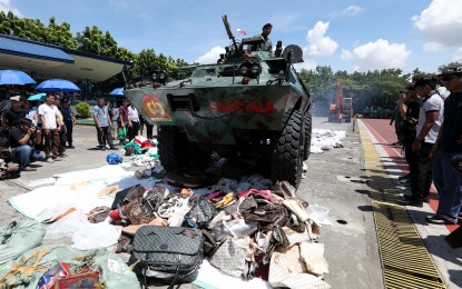 <p><strong>COUNTERFEIT</strong>. Fake goods are being destroyed at Camp Crame in Quezon City in an undated photo. The National Committee on Intellectual Property Rights (NCIPR) seized a total of PHP26.68 billion worth of counterfeit goods in 2023. <em>(File photo)</em></p>